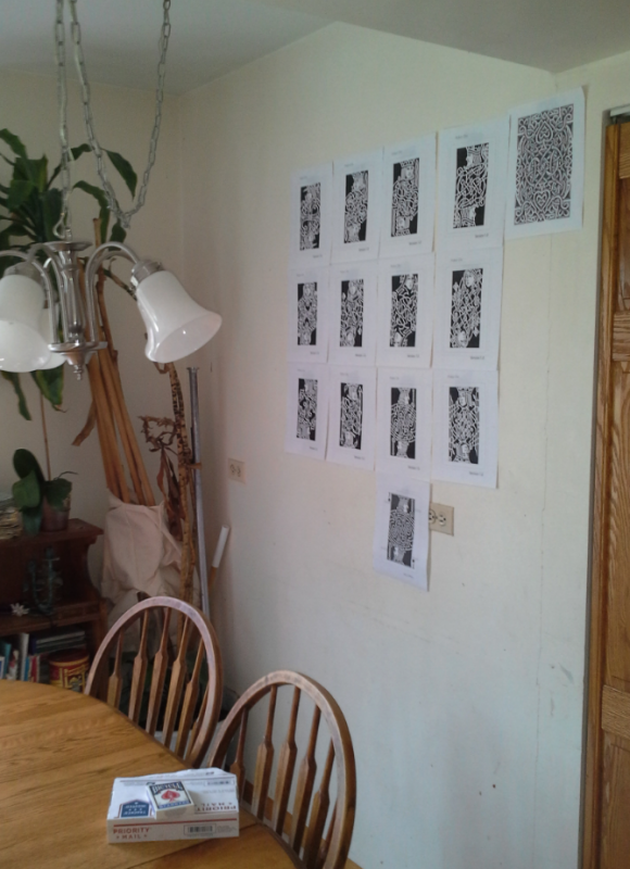 My Kitchen wall with Interlace drafts on it.